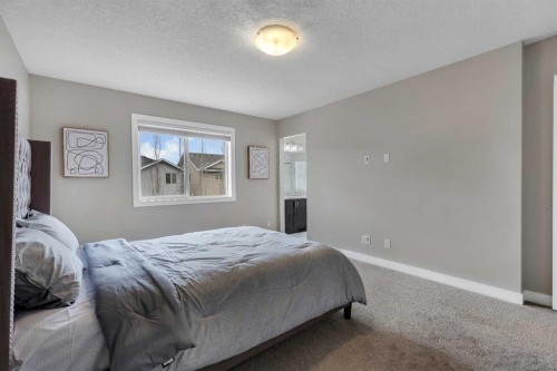 175 Brightoncrest Point Se, Calgary, AB - Indoor Photo Showing Bedroom