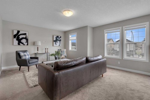 175 Brightoncrest Point Se, Calgary, AB - Indoor Photo Showing Living Room