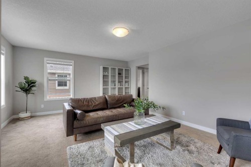 175 Brightoncrest Point Se, Calgary, AB - Indoor Photo Showing Living Room