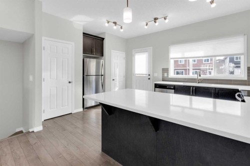 140 Sundown Road, Cochrane, AB - Indoor Photo Showing Kitchen