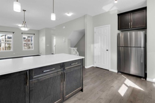 140 Sundown Road, Cochrane, AB - Indoor Photo Showing Kitchen