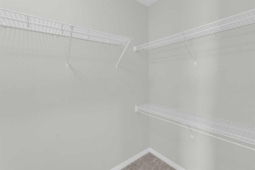 140 Sundown Road, Cochrane, AB - Indoor With Storage