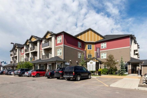 140 Sundown Road, Cochrane, AB - Outdoor With Facade