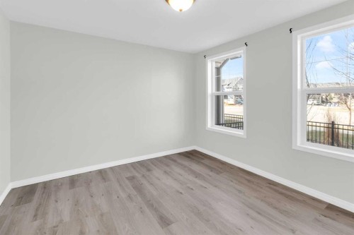 140 Sundown Road, Cochrane, AB - Indoor Photo Showing Other Room