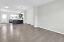 140 Sundown Road, Cochrane, AB  - Indoor Photo Showing Living Room 