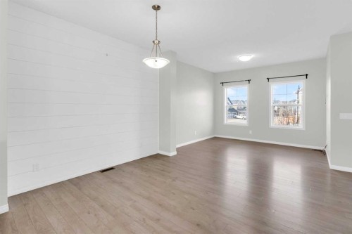 140 Sundown Road, Cochrane, AB - Indoor Photo Showing Other Room
