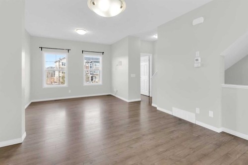 140 Sundown Road, Cochrane, AB - Indoor Photo Showing Other Room