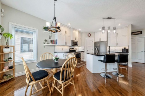 4 Cimarron Trail, Okotoks, AB - Indoor Photo Showing Dining Room