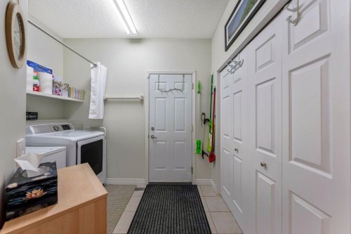 4 Cimarron Trail, Okotoks, AB - Indoor Photo Showing Laundry Room