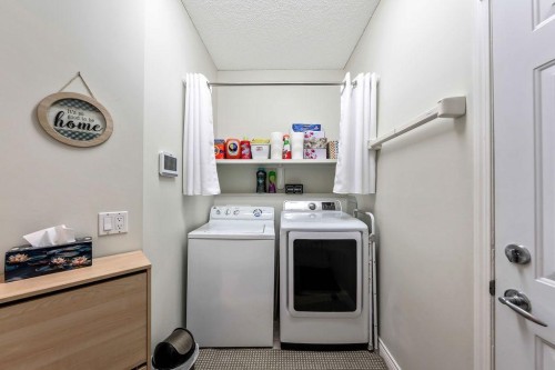 4 Cimarron Trail, Okotoks, AB - Indoor Photo Showing Laundry Room