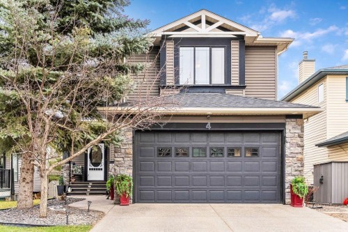 4 Cimarron Trail, Okotoks, AB - Outdoor With Facade