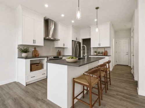 229 Dawson Wharf Road, Chestermere, AB - Indoor Photo Showing Kitchen With Upgraded Kitchen
