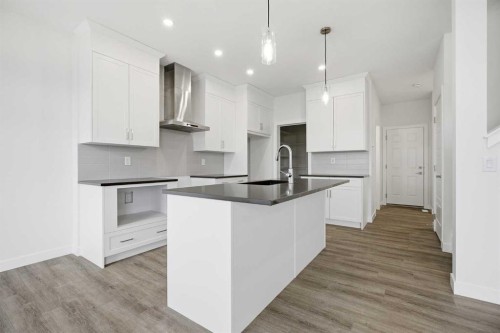 229 Dawson Wharf Road, Chestermere, AB - Indoor Photo Showing Kitchen With Upgraded Kitchen