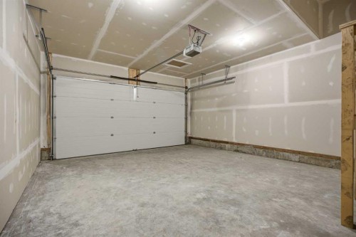 229 Dawson Wharf Road, Chestermere, AB - Indoor Photo Showing Garage