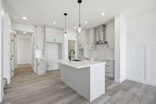260 Dawson Wharf Crescent, Chestermere, AB - Indoor Photo Showing Kitchen With Upgraded Kitchen