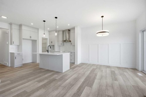 260 Dawson Wharf Crescent, Chestermere, AB - Indoor Photo Showing Kitchen With Upgraded Kitchen