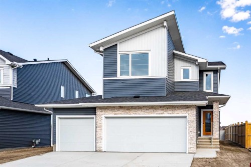 260 Dawson Wharf Crescent, Chestermere, AB - Outdoor With Exterior