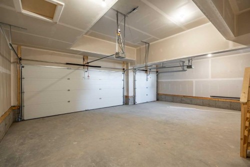 260 Dawson Wharf Crescent, Chestermere, AB - Indoor Photo Showing Garage