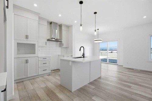 260 Dawson Wharf Crescent, Chestermere, AB - Indoor Photo Showing Kitchen With Upgraded Kitchen