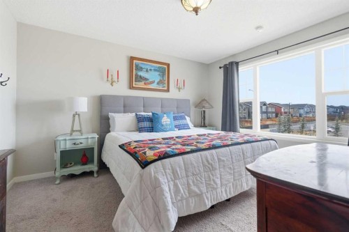 225 Fireside Drive, Cochrane, AB - Indoor Photo Showing Bedroom