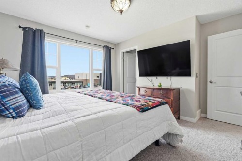 225 Fireside Drive, Cochrane, AB - Indoor Photo Showing Bedroom
