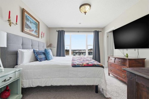 225 Fireside Drive, Cochrane, AB - Indoor Photo Showing Bedroom
