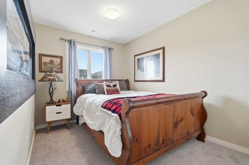 225 Fireside Drive, Cochrane, AB - Indoor Photo Showing Bedroom