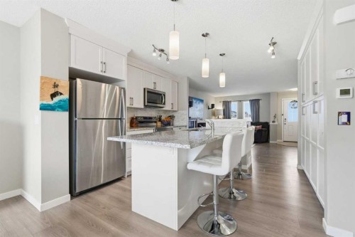 225 Fireside Drive, Cochrane, AB - Indoor Photo Showing Kitchen With Upgraded Kitchen