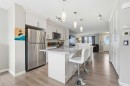 225 Fireside Drive, Cochrane, AB  - Indoor Photo Showing Kitchen With Upgraded Kitchen 