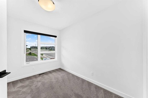 3101-55 Lucas Way Nw, Calgary, AB - Indoor Photo Showing Other Room