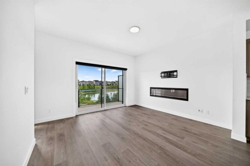 3101-55 Lucas Way Nw, Calgary, AB - Indoor Photo Showing Living Room With Fireplace