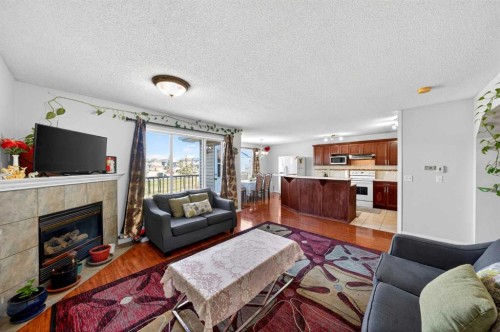 110 Martha'S Haven Green Ne, Calgary, AB - Indoor Photo Showing Living Room With Fireplace