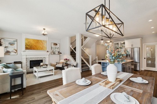 36 Crestbrook Link Sw, Calgary, AB - Indoor With Fireplace