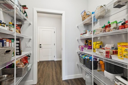 36 Crestbrook Link Sw, Calgary, AB - Indoor With Storage