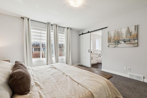 36 Crestbrook Link Sw, Calgary, AB - Indoor Photo Showing Bedroom