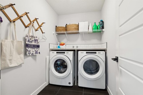 36 Crestbrook Link Sw, Calgary, AB - Indoor Photo Showing Laundry Room