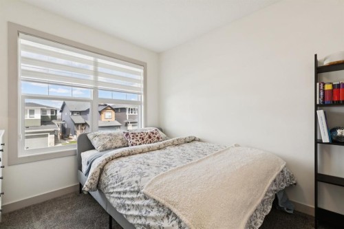 36 Crestbrook Link Sw, Calgary, AB - Indoor Photo Showing Bedroom