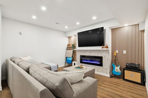 36 Crestbrook Link Sw, Calgary, AB - Indoor With Fireplace