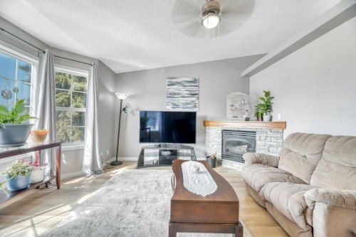 389 Strathford Crescent, Strathmore, AB - Indoor Photo Showing Living Room With Fireplace