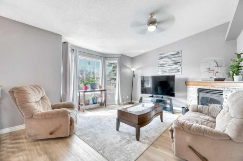 389 Strathford Crescent, Strathmore, AB - Indoor Photo Showing Living Room With Fireplace