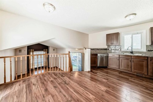 51 Covington Rise Ne, Calgary, AB - Indoor Photo Showing Kitchen With Double Sink