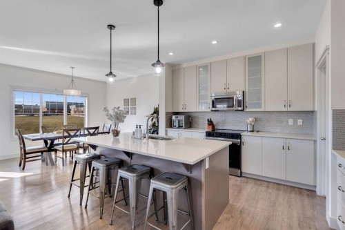 49 Marquis Grove Se, Calgary, AB - Indoor Photo Showing Kitchen With Double Sink With Upgraded Kitchen