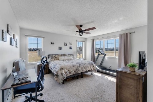 49 Marquis Grove Se, Calgary, AB - Indoor Photo Showing Bedroom