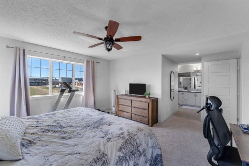 49 Marquis Grove Se, Calgary, AB - Indoor Photo Showing Bedroom