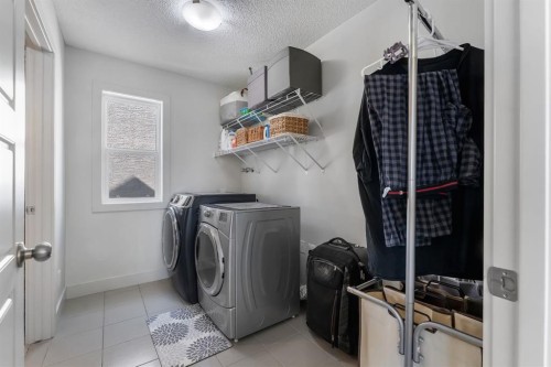 49 Marquis Grove Se, Calgary, AB - Indoor Photo Showing Laundry Room