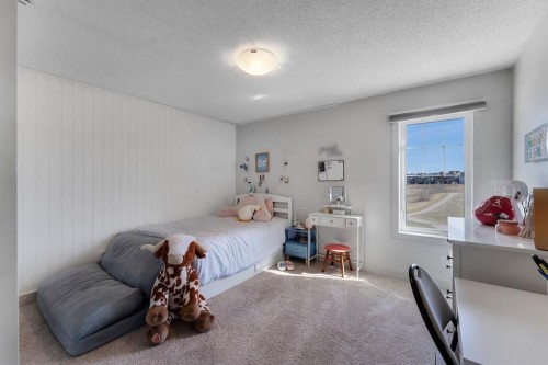 49 Marquis Grove Se, Calgary, AB - Indoor Photo Showing Bedroom