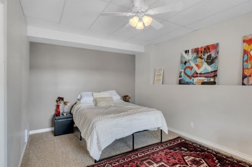 49 Marquis Grove Se, Calgary, AB - Indoor Photo Showing Bedroom
