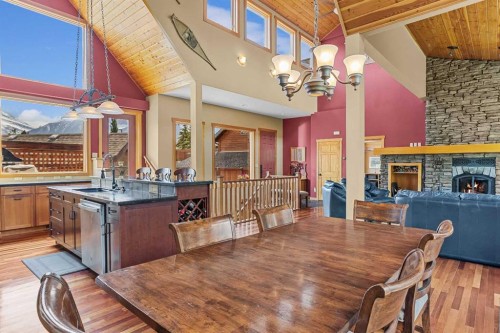 214 Eagle Point, Canmore, AB - Indoor Photo Showing Dining Room With Fireplace