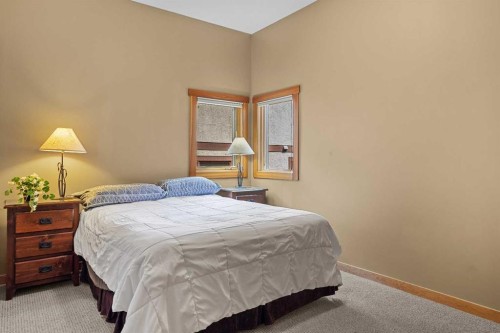 214 Eagle Point, Canmore, AB - Indoor Photo Showing Bedroom