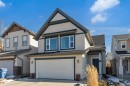 24 Evansbrooke Point Nw, Calgary, AB  - Outdoor With Facade 